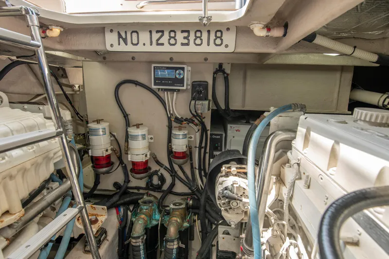 Slide: The Image of Engine room of 2017 Sea Ray Fly 510 yacht, showcasing mechanical components and equipment. - 91