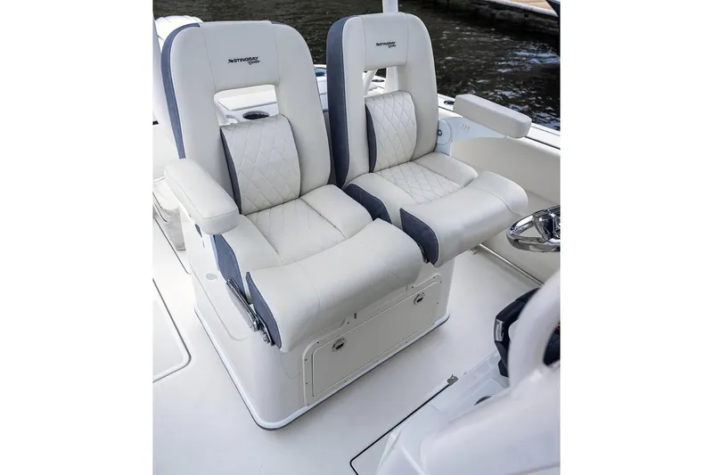 Slide: The Image of Manufacturer Provided Image: 2025 Stingray 253 CC boat seats, white and gray, luxurious design. - 20