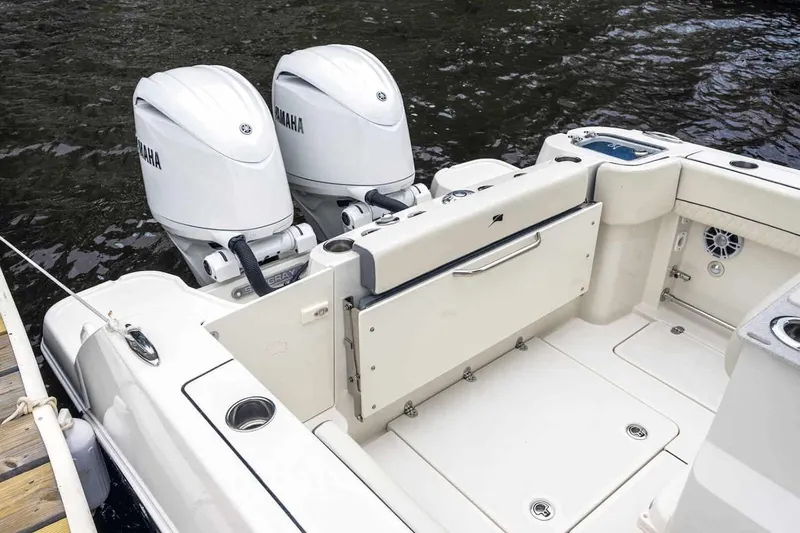 Slide: The Image of Manufacturer Provided Image: 2025 Stingray 253 CC boat with dual Yamaha engines on water. - 24