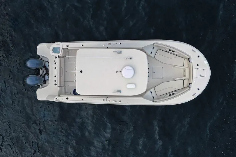 Slide: The Image of Manufacturer Provided Image: Aerial view of 2025 Stingray 253 CC boat on dark water. - 27