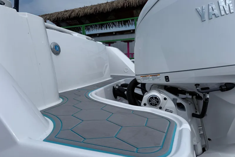 Slide: The Image of 2025 Stingray 253 CC boat with Yamaha engine, featuring sleek design and modern detailing. - 3