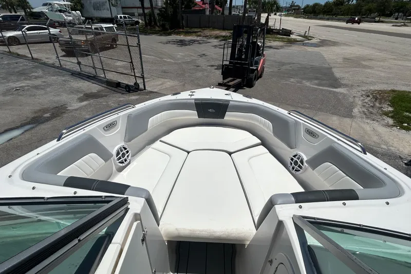 Slide: The Image of 2023 Chaparral 23 SSi OB boat interior with spacious seating and modern design. - 14