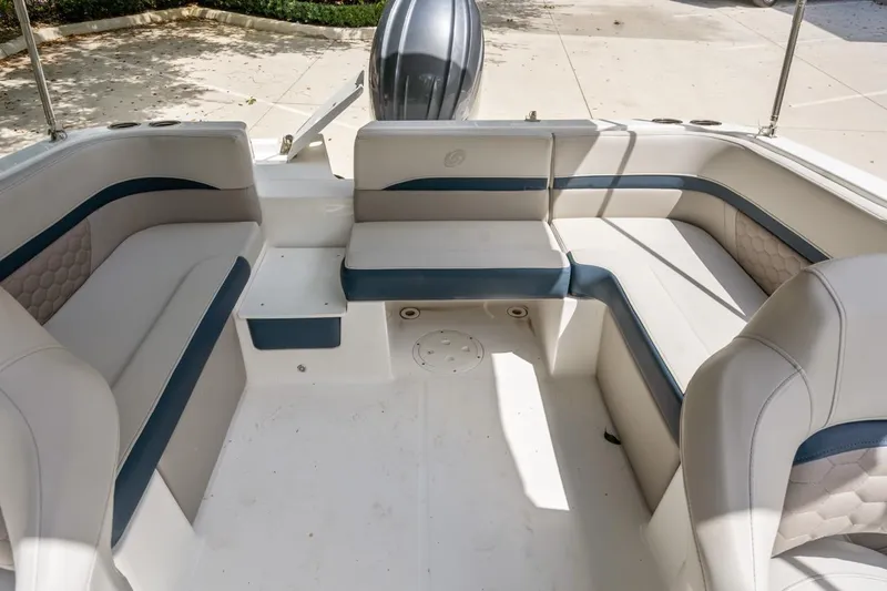 Slide: The Image of 2025 Hurricane SunDeck 217 OB boat interior with spacious seating and modern design. - 9