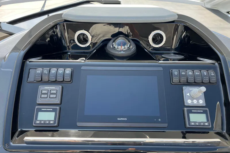 Slide: The Image of Dashboard of 2026 Beneteau Gran Turismo 41 with Garmin display and controls. - 17