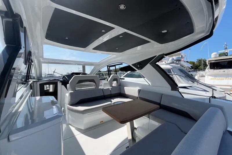 Slide: The Image of 2026 Beneteau Gran Turismo 41 yacht interior with sleek seating and modern design. - 19