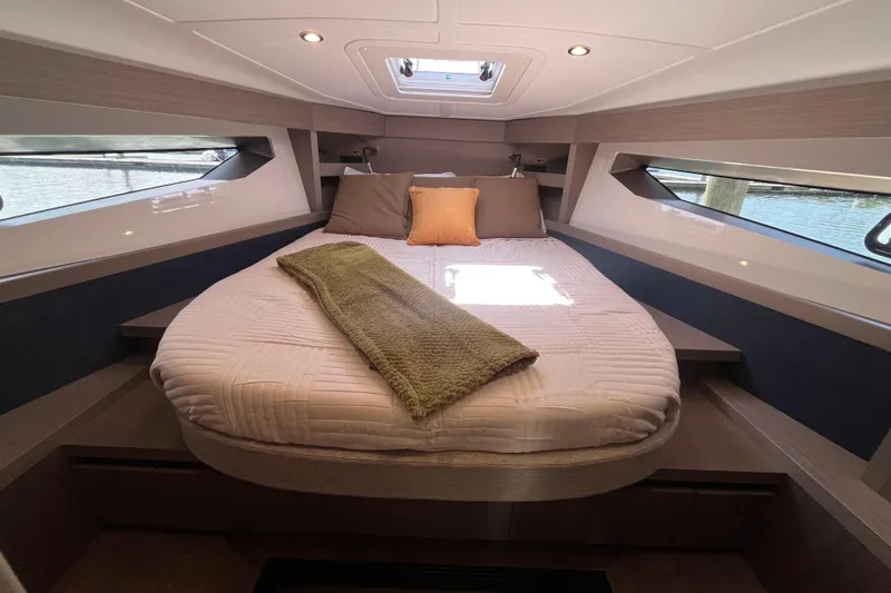 Slide: The Image of Luxurious cabin interior of 2026 Beneteau Gran Turismo 41 yacht with cozy bedding. - 25