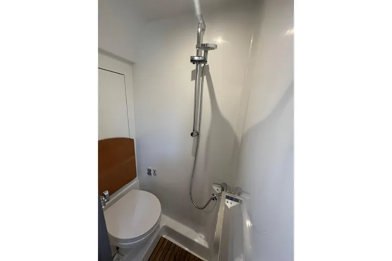 Slide: The Image of 2026 Beneteau Gran Turismo 41 yacht bathroom with shower and toilet. - 36