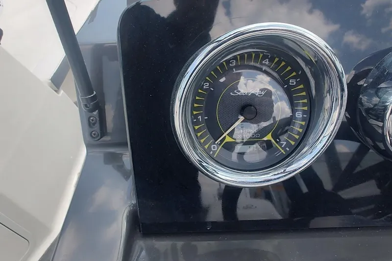 Slide: The Image of Close-up of 2018 Sea Ray SPX 190 RPM gauge on boat dashboard. - 15