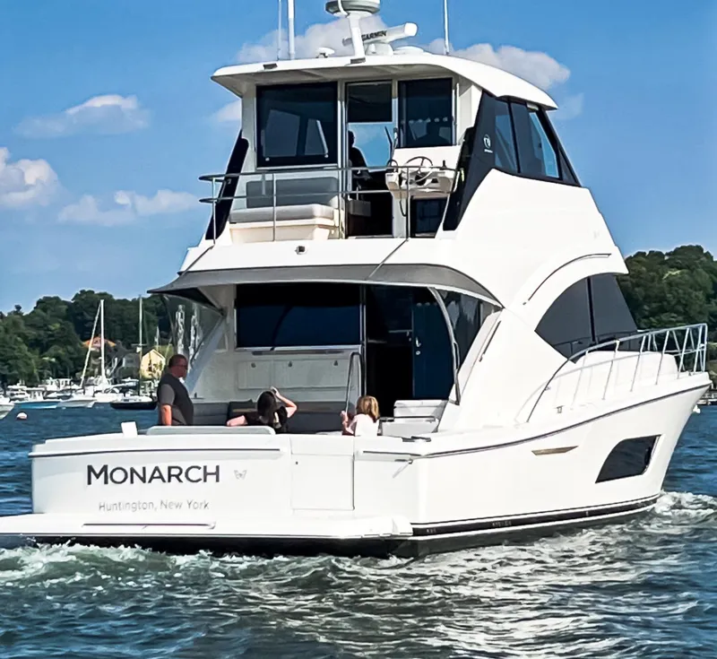 Slide: The Image of 2023 Riviera 57 Enclosed Flybridge yacht cruising in Huntington, New York waters. - 3