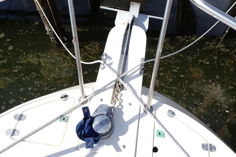 Slide: The Image of Bow of 2000 Albin 28 Tournament Express with anchor and ropes. - 18