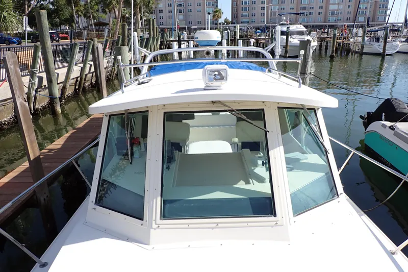 Slide: The Image of 2000 Albin 28 Tournament Express docked at marina, front view. - 20