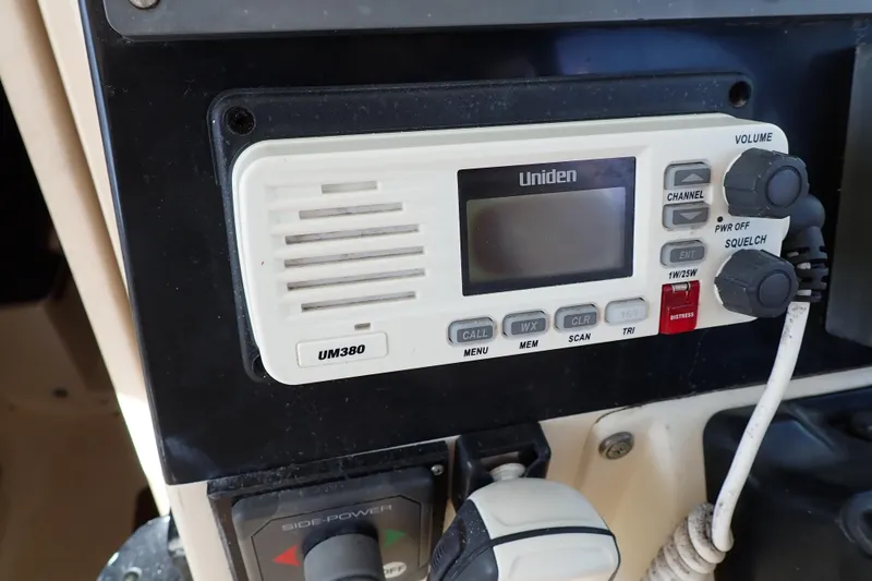 Slide: The Image of Uniden UM380 radio on 2000 Albin 28 Tournament Express boat dashboard. - 28