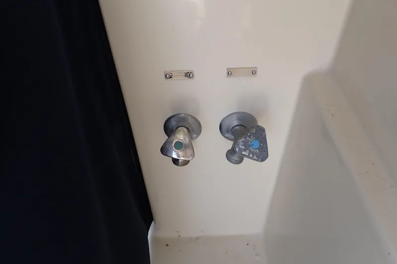 Slide: The Image of Boat shower controls on a 2000 Albin 28 Tournament Express. - 34