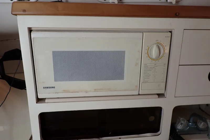 Slide: The Image of Built-in Samsung microwave in Albin 28 Tournament Express boat kitchen, 2000 model. - 46