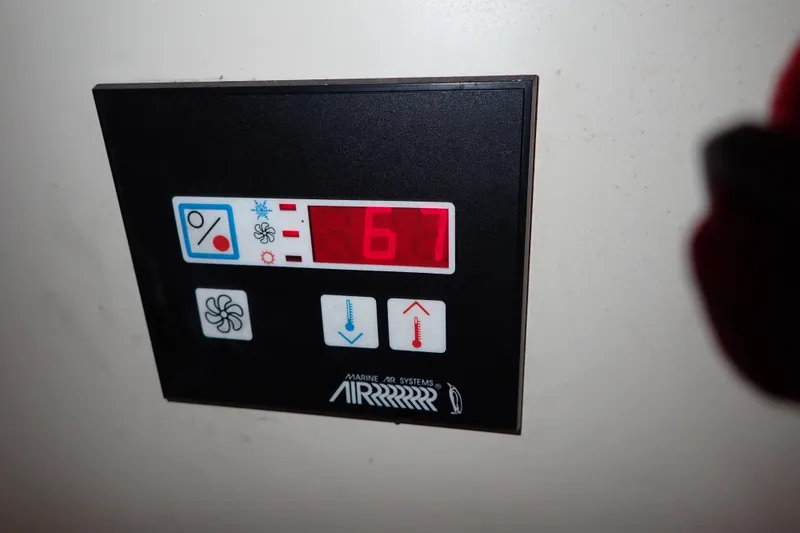 Slide: The Image of Control panel of a 2000 Albin 28 Tournament Express boat, displaying temperature settings. - 47