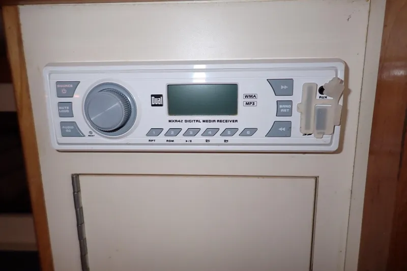 Slide: The Image of Digital media receiver in a 2000 Albin 28 Tournament Express boat interior. - 48