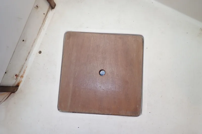 Slide: The Image of Wooden hatch cover on 2000 Albin 28 Tournament Express boat deck. - 72