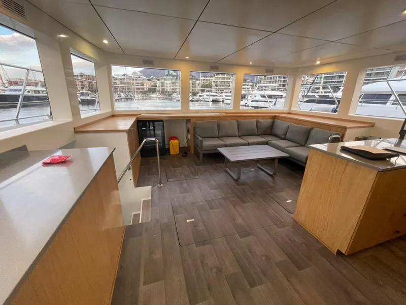 Slide: The Image of Luxurious interior of 2024 Leeuwin 55 yacht with spacious seating and modern design. - 11