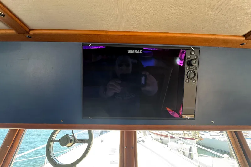 Slide: The Image of Simrad navigation system on 1995 Nordhavn 46 yacht dashboard. - 29
