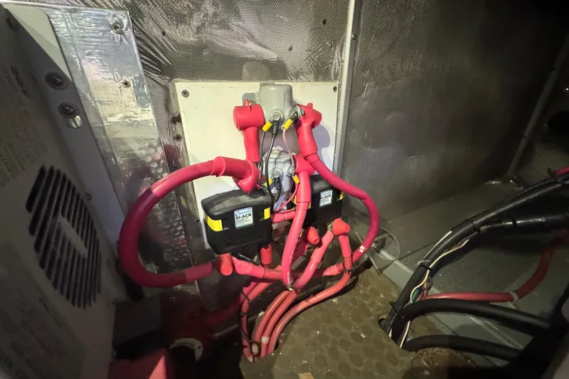 Slide: The Image of Electrical wiring setup in a 1995 Nordhavn 46 boat engine room. - 39