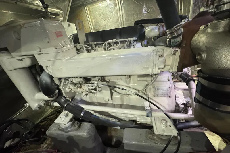 Slide: The Image of Engine room of a 1995 Nordhavn 46 yacht, showcasing detailed machinery components. - 45
