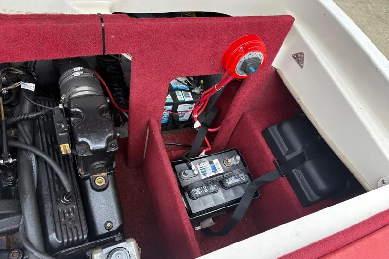 Slide: The Image of Engine compartment of a 2001 Bayliner 210 Classic boat with battery and wiring. - 5