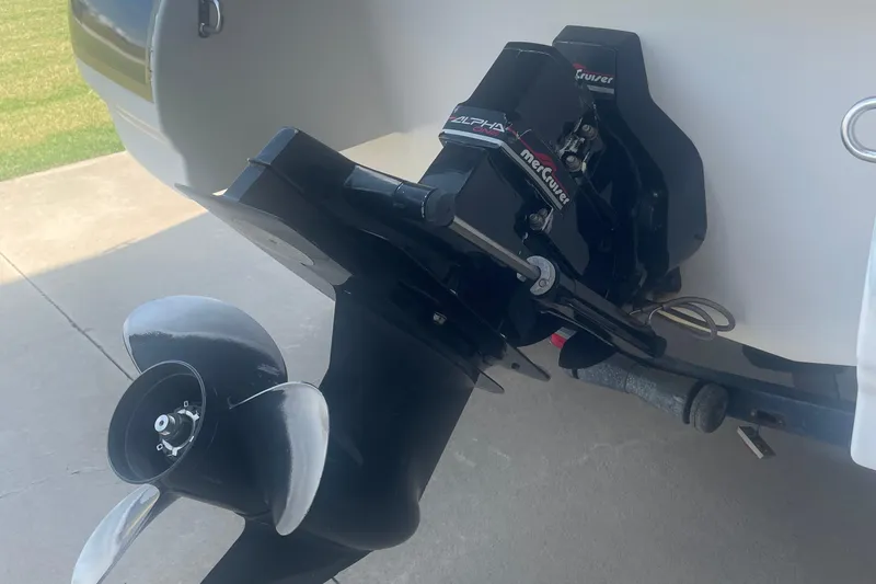 Slide: The Image of 1999 Bryant 214 Cuddy boat with MerCruiser Alpha outdrive on a trailer. - 12