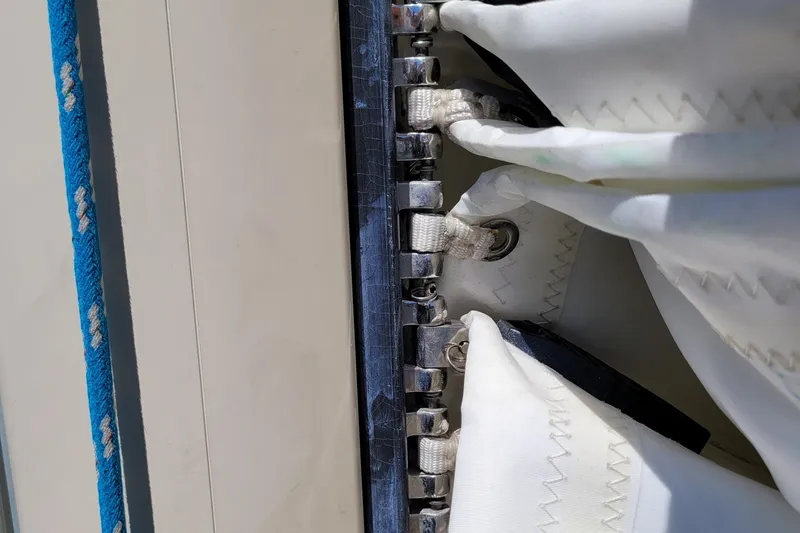 Slide: The Image of Close-up of sail rigging on a 2004 Alerion Express 28 sailboat. - 15