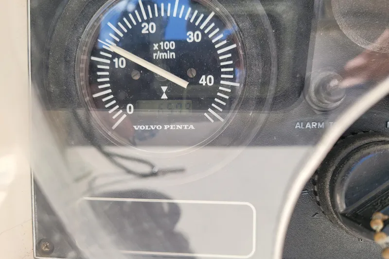 Slide: The Image of Volvo Penta tachometer on 2004 Alerion Express 28 sailboat dashboard. - 23