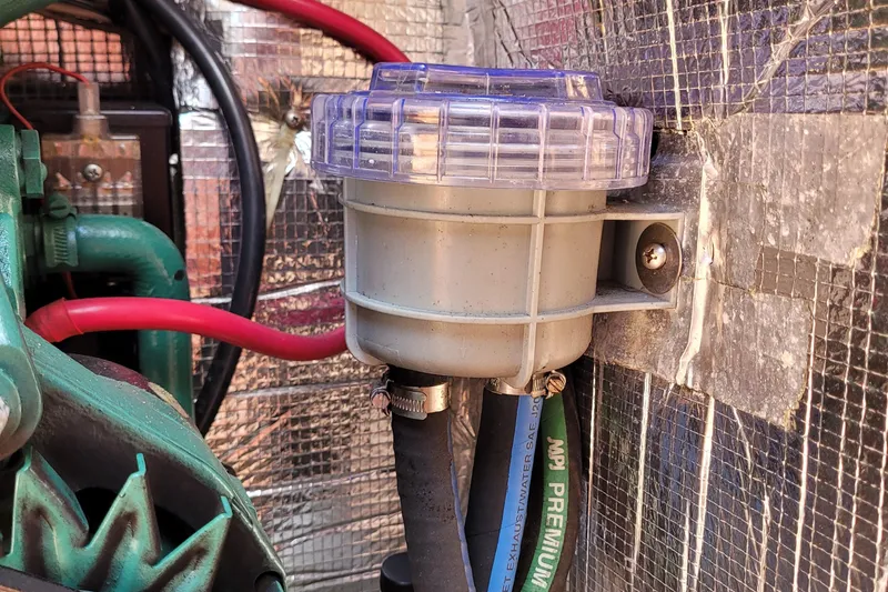 Slide: The Image of Engine compartment of a 2004 Alerion Express 28 with visible wiring and components. - 35