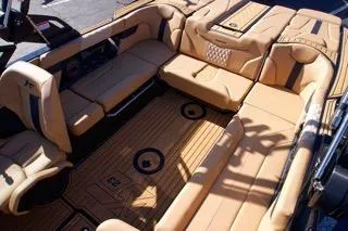 Slide: The Image of Luxurious interior of 2025 MasterCraft XT23 boat with tan leather seating. - 9