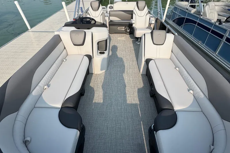 Slide: The Image of 2025 Tahoe Pontoon 25 LSZ Versatile Rear Bench with luxurious seating and modern design. - 2