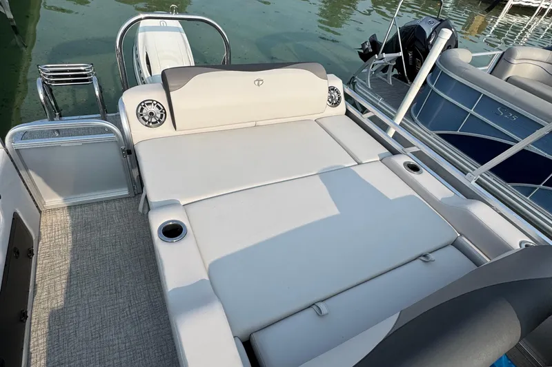 Slide: The Image of 2025 Tahoe Pontoon 25 LSZ Versatile Rear Bench with spacious seating and cup holders. - 4