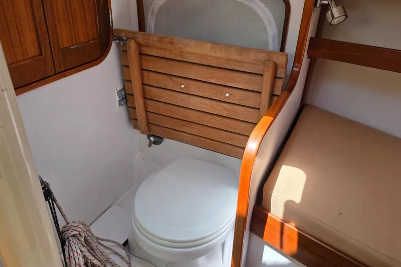 Slide: The Image of Interior of 2020 Alerion Express 33 sailboat with compact marine toilet. - 28