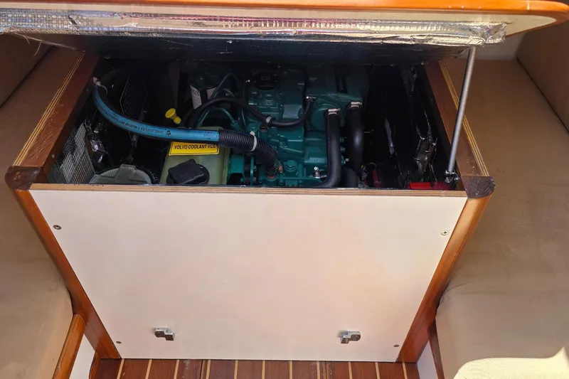 Slide: The Image of Engine compartment of 2020 Alerion Express 33 sailboat, featuring Volvo coolant system. - 30