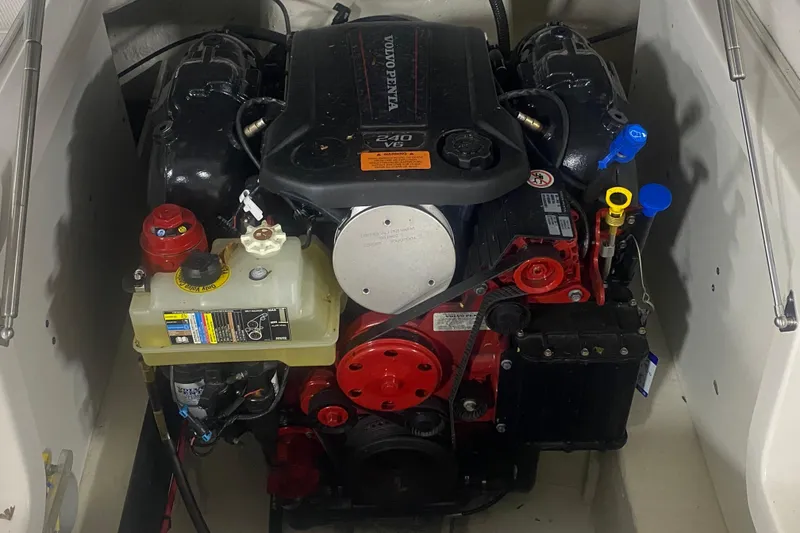 Slide: The Image of Engine compartment of a 2020 Chaparral 237 SSX boat with Volvo Penta 240 V6 engine. - 10