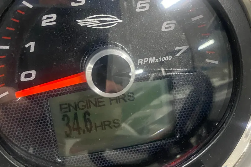 Slide: The Image of Close-up of 2023 Chaparral 21 SSi tachometer showing 34.6 engine hours. - 7