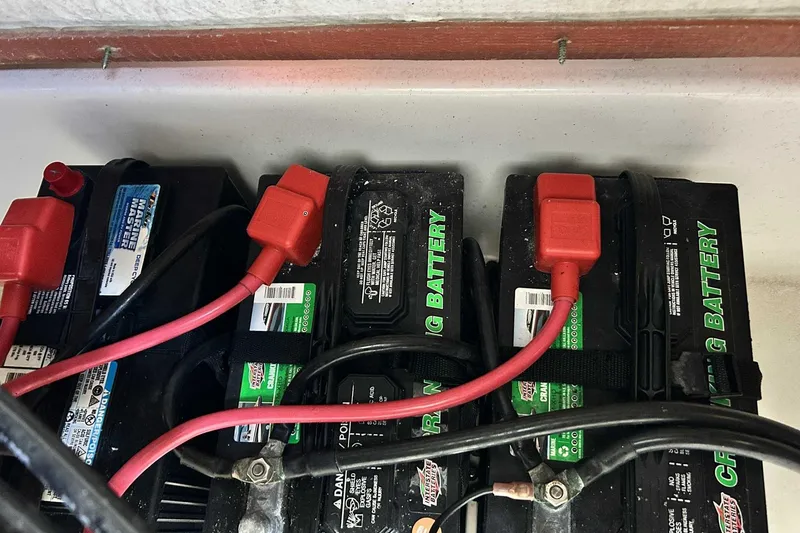 Slide: The Image of Batteries in a 2019 Sea Hunt Gamefish 27 Forward Seating boat. - 31