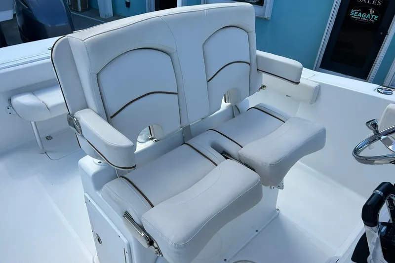 Slide: The Image of 2019 Sea Hunt Gamefish 27 Forward Seating with white cushioned helm seats. - 42