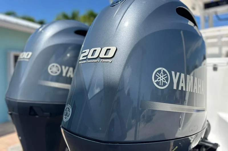 Slide: The Image of Twin Yamaha 200 outboard engines on a 2019 Sea Hunt Gamefish 27 boat. - 6