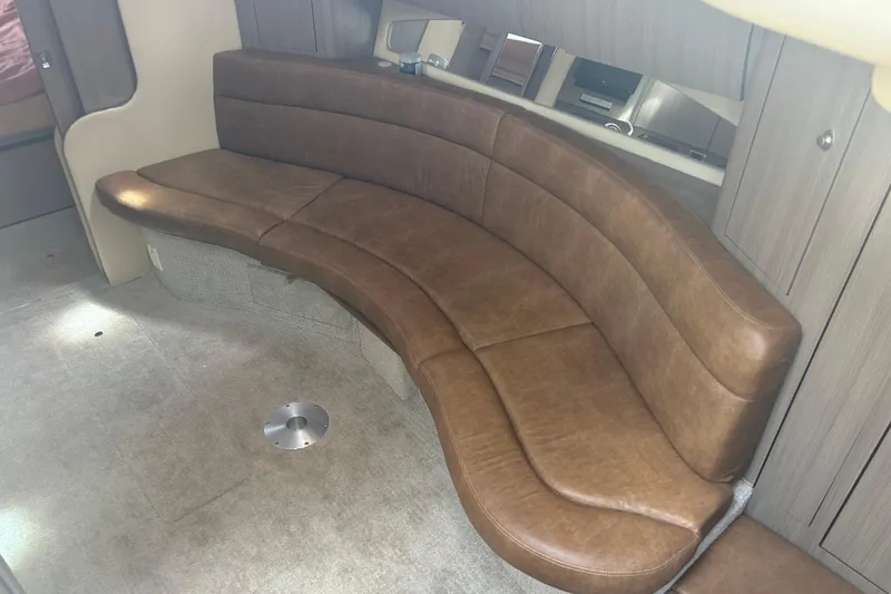 Slide: The Image of Luxurious brown leather seating in 2005 Sea Ray 360 Sundancer cabin interior. - 23