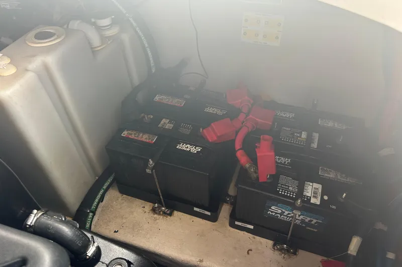 Slide: The Image of Batteries in a 2005 Sea Ray 360 Sundancer boat engine compartment. - 42