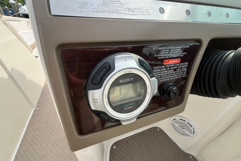 Slide: The Image of Control panel of a 2013 Sea Ray 280 Sundeck with Sony marine audio system. - 21