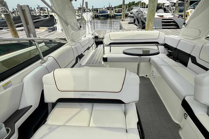 Slide: The Image of Luxurious interior of a 2020 Formula 290 Bowrider boat at a marina. - 15