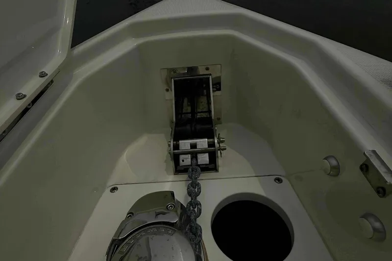 Slide: The Image of 2020 Formula 290 Bowrider anchor compartment with chain and winch system. - 23