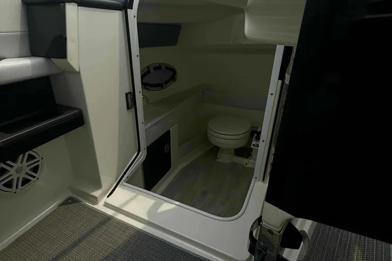 Slide: The Image of 2020 Formula 290 Bowrider interior cabin with toilet and modern design. - 26