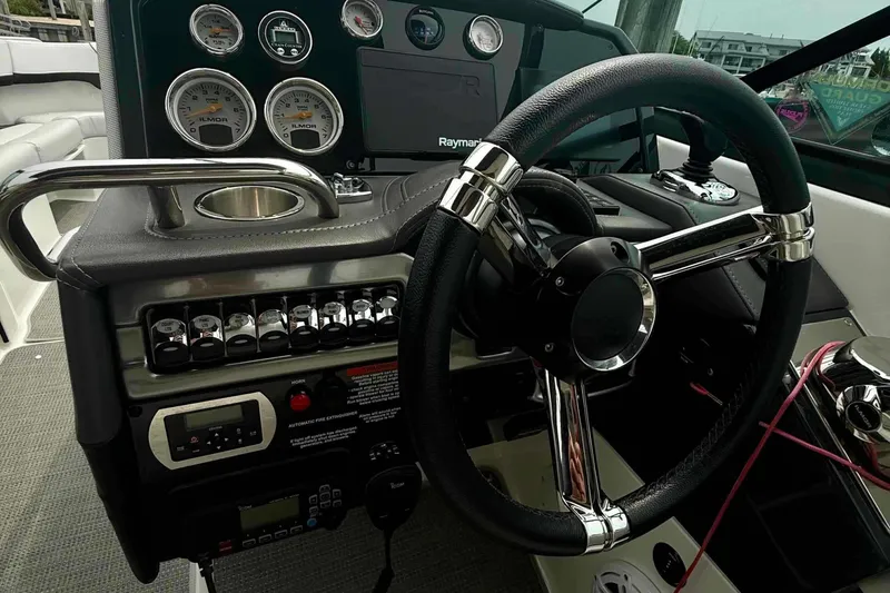 Slide: The Image of 2020 Formula 290 Bowrider dashboard with steering wheel and control panel. - 28