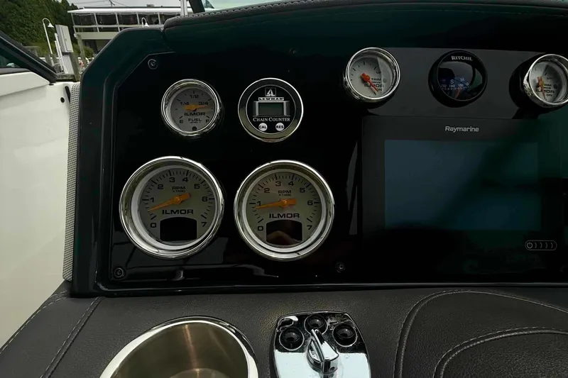 Slide: The Image of Dashboard of a 2020 Formula 290 Bowrider with gauges and Raymarine display. - 33