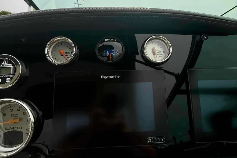 Slide: The Image of Dashboard of 2020 Formula 290 Bowrider with gauges and Raymarine display. - 34
