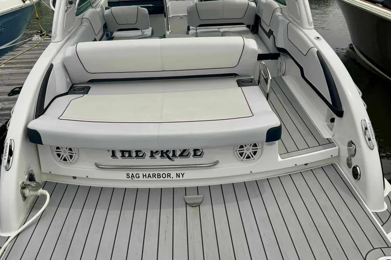 Slide: The Image of 2020 Formula 290 Bowrider boat with spacious seating, docked at Sag Harbor, NY. - 8